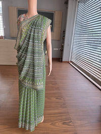 Green Georgette with real mirror and cutdana work