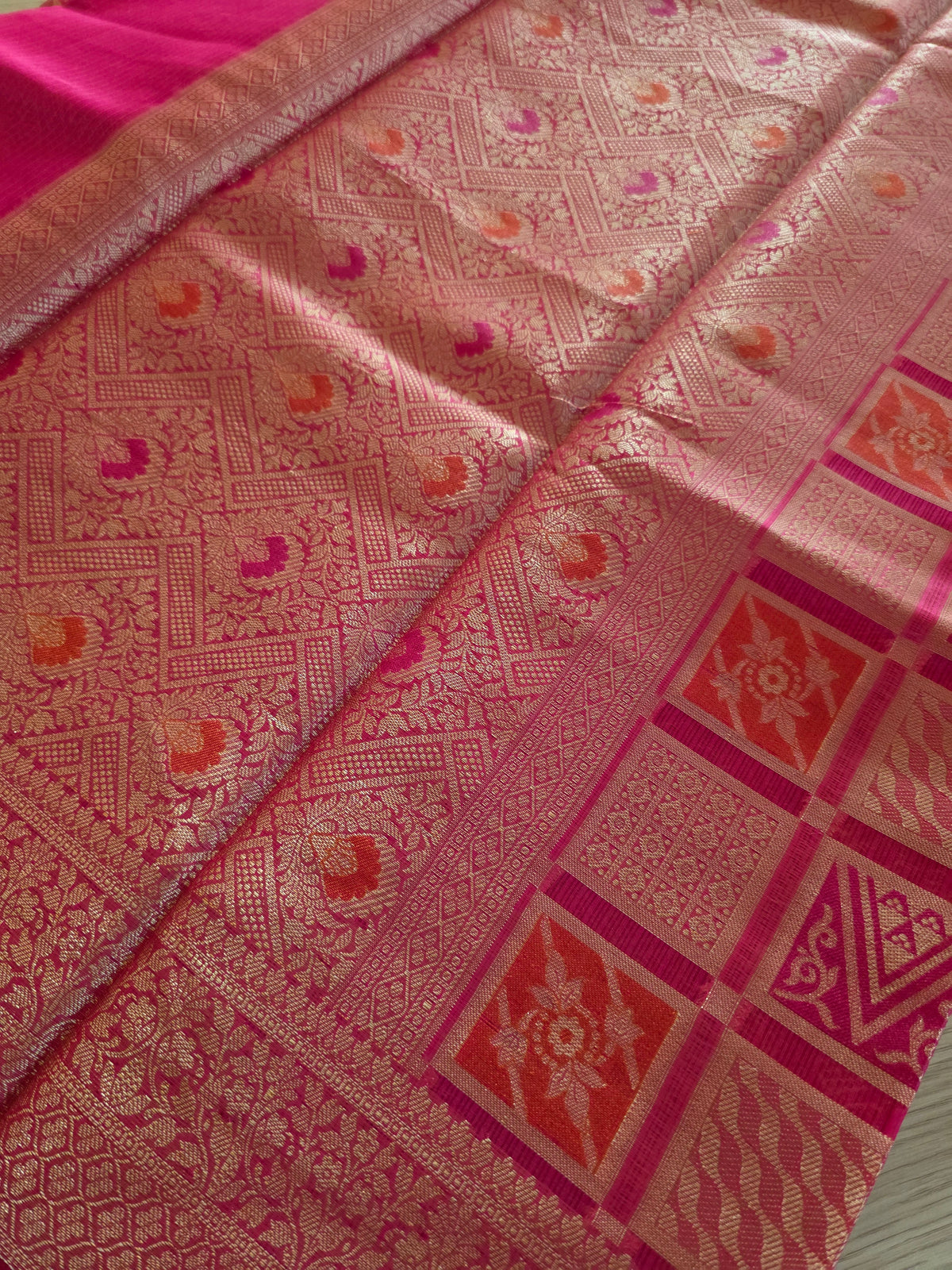 Red with gold zari weaving