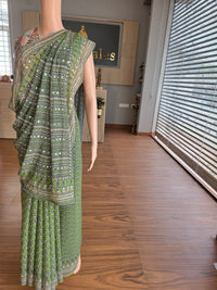 Green  Georgette with real mirror and cutdana work